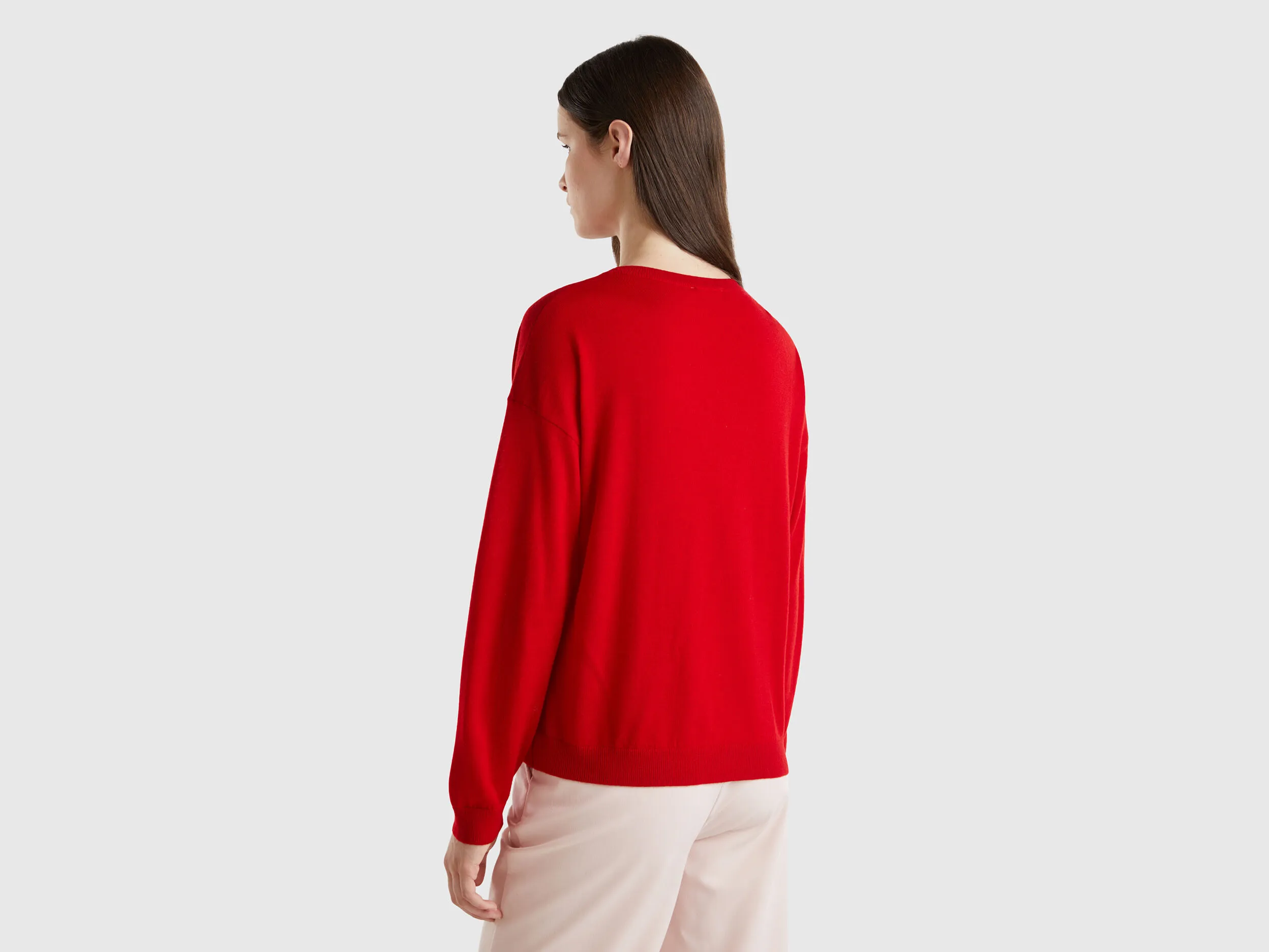 Boat neck sweater in pure Merino wool - Red | Benetton