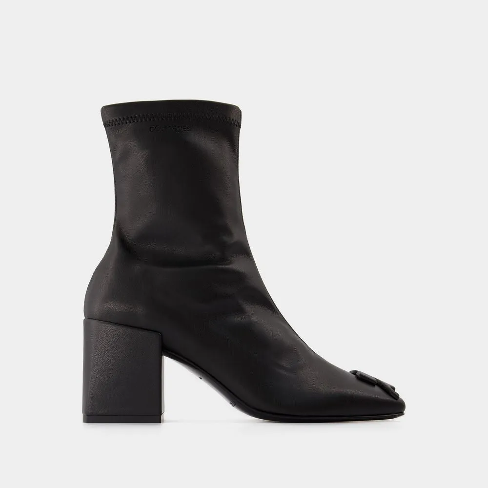 COURREGS Chic Mini Ankle Boots in Black Eco-Leather